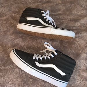 Woman’s Black Hightop Vans